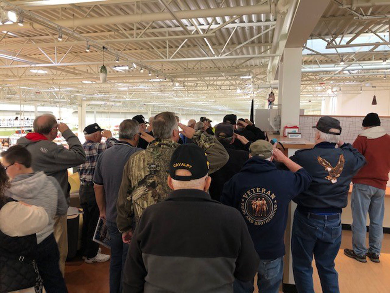 Heroes Cafe veterans saluting.jpg